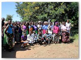 Dr Valeta posing with farmers