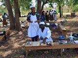 Chefs demonstrating fish processing 