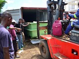 Forklifter operation to move the tanks from the container to the slab