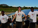 Germany and Malawians posing in between of the work